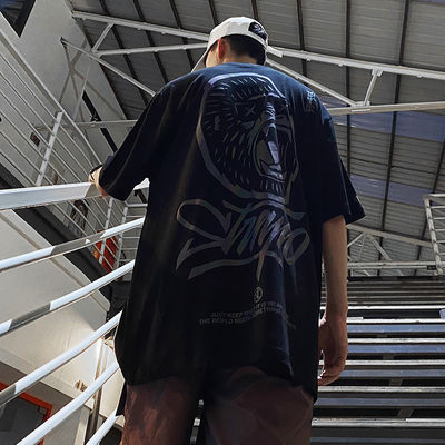Benutzerdefiniertes Logo Hip Hop-Stil UV-reflektierendes Fluoreszenz-T-Shirt Druck für Plussize Männer