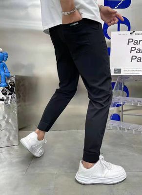 Flat Front Style Männer Cargo Hosen InStock mit benutzerdefinierten Knöpfen Locker Fitness Jogger