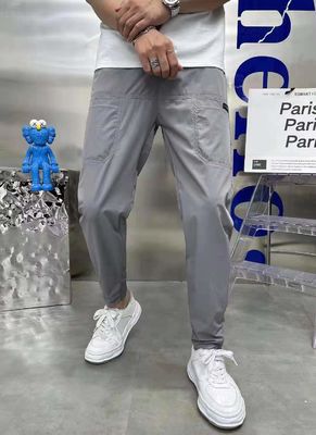Flat Front Style Männer Cargo Hosen InStock mit benutzerdefinierten Knöpfen Locker Fitness Jogger